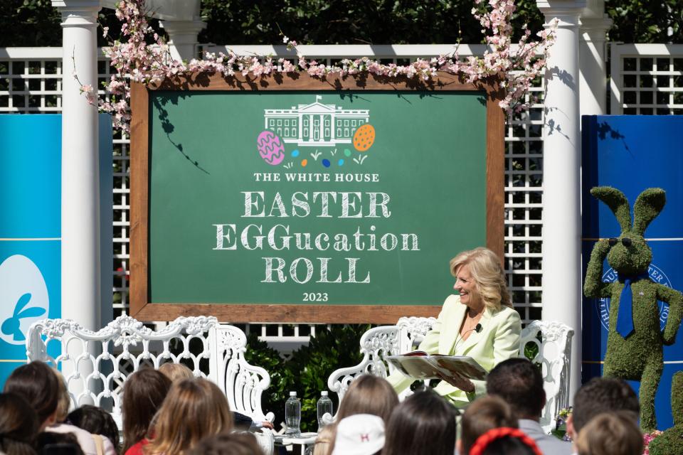 First lady Jill Biden reads to children at the White House Easter Eggucation Roll in 2023. The reading nook was temporarily located in the Jacqueline Kennedy Garden.