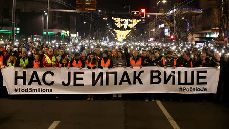 People attend a march on the first anniversary of the murder of opposition Serb politician Oliver Ivanovic, in Belgrade, Serbia January 16, 2019. The murder happened in the town of Mitrovica in Kosovo. REUTERS/Kevin Coombs