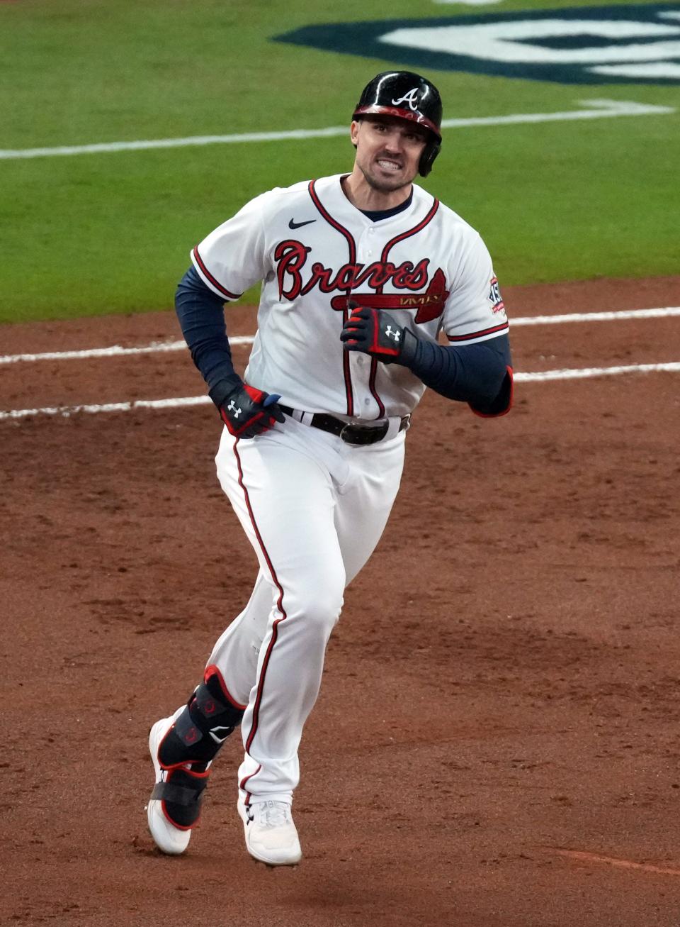Adam Duvall rounds the bases after hitting a grand slam for the Braves against the Astros in Game 5 of the World Series.