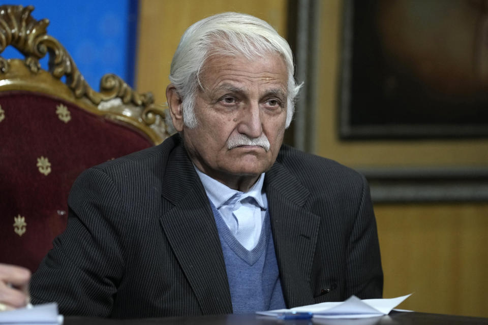 Farhatullah Babar, a veteran human rights activist and member of the Human Rights Commission of Pakistan, listens to a reporter during a news conference, in Islamabad, Pakistan, Monday, Jan. 1, 2024. Pakistan's rights body said Monday there is little chance of free and fair parliamentary elections next month because of "pre-poll rigging." It also expressed concerned about authorities rejecting most candidates from former premier Imran Khan's party, including Khan himself. (AP Photo/Anjum Naveed)