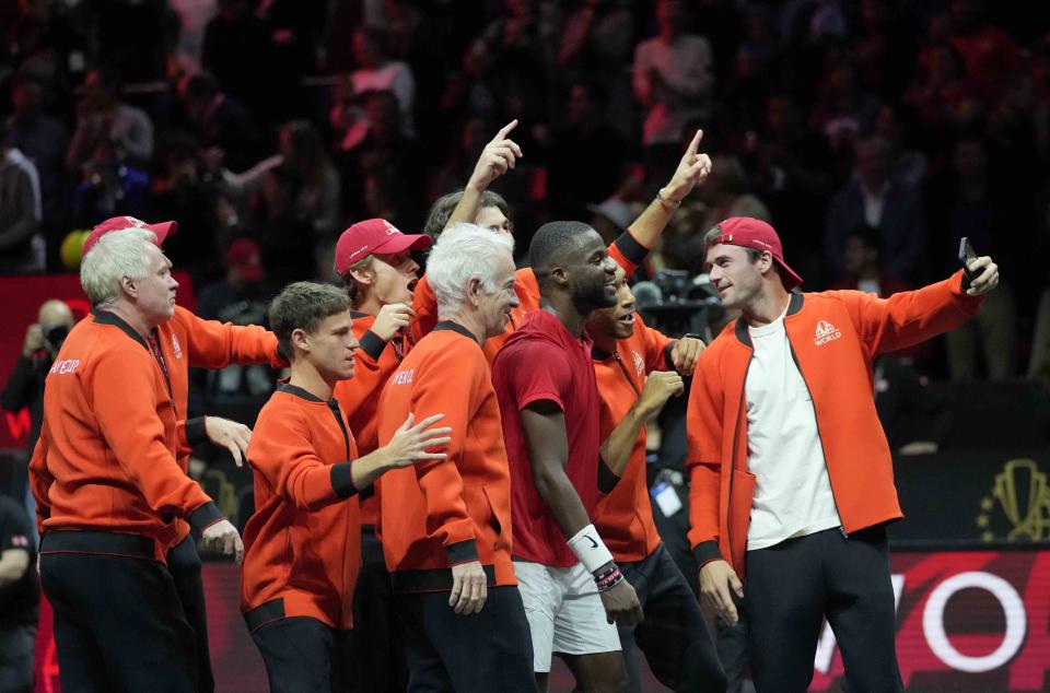 Team World's players take a selfie after winning the Laver Cup tennis tournament at the O2 arena in London, Sunday, Sept. 25, 2022. (AP Photo/Kin Cheung)