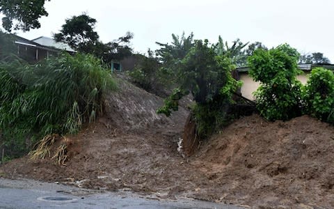 View of a residential area affected by a landslide due to heavy rains caused by tropical storm Nate in Cartago, 25 kilometres East of San Jose on October 5, 2017 - Credit: AFP