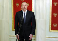 Azerbaijan's President Ilham Aliyev speaks to media after his talks with Russian President Vladimir Putin and Armenian Prime Minister Nikol Pashinyan in Kremlin in Moscow, Russia, Monday, Jan. 11, 2021. Russian President Vladimir Putin on Monday hosted his counterparts from Armenia and Azerbaijan, their first meeting since a Russia-brokered truce ended six weeks of fighting over Nagorno-Karabakh. (Mikhail Klimentyev, Sputnik, Kremlin Pool Photo via AP)