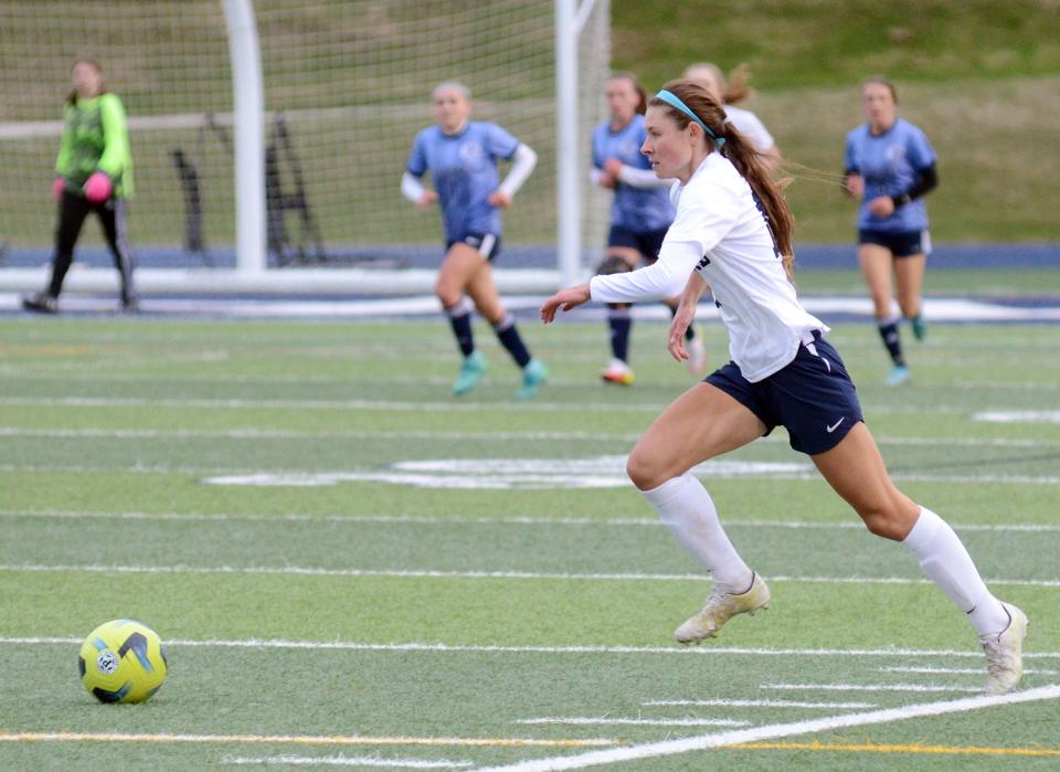 Alivia Zaremba moves the ball during a high school soccer matchup between Gaylord and Petoskey on Thursday, April 27 in Petoskey, Mich.