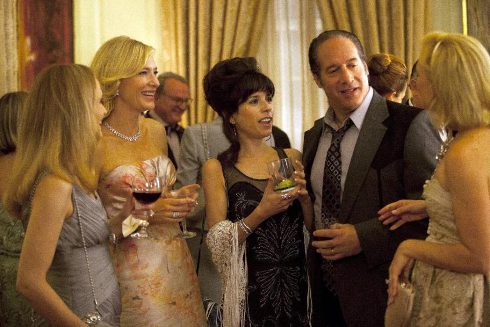 In this film image released by Sony Pictures Classics shows, from second left, Cate Blanchette, Sally Hawkins, and Andrew Dice Clay in a scene from the Woody Allen film, "Blue Jasmine." “Blue Jasmine,” “Nebraska” and “American Hustle” have been nominated for Writers Guild honors, continuing their imprint on Hollywood’s awards season. The three comedies gained nods on Friday, Jan. 3, 2014, for exceptional screen writing. (AP Photo/Sony Pictures Classics)