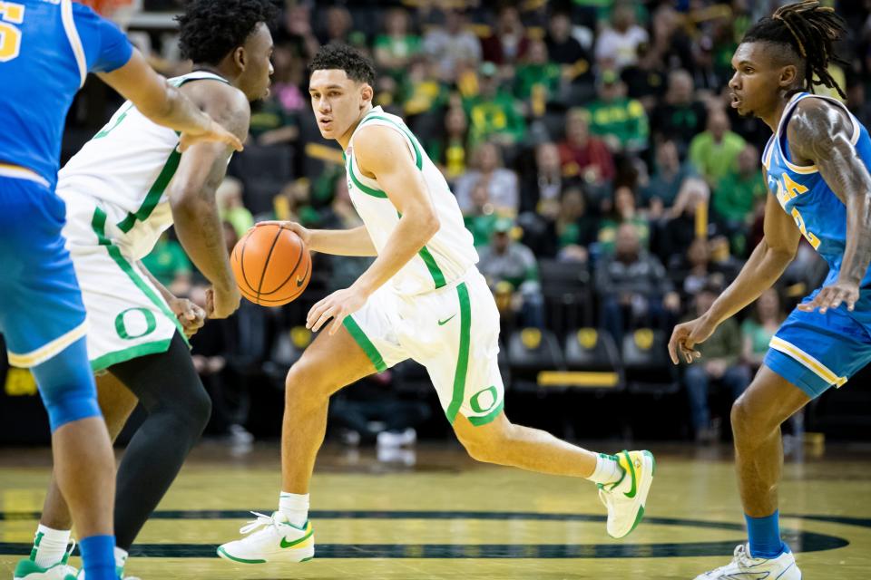 Oregon guard Jackson Shelstad drives the ball up the court as the Oregon Ducks host the UCLA Bruins Saturday, Dec. 30, 2023, at Matthew Knight Arena in Eugene, Ore.