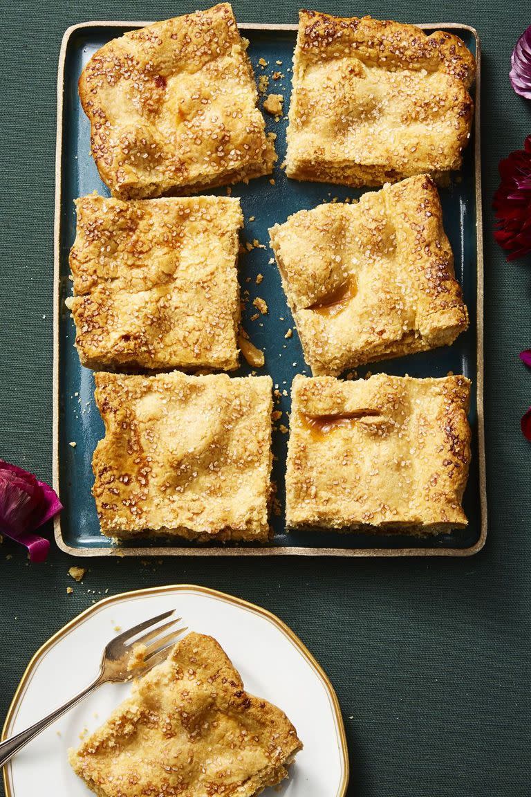 apple slab pie cut into squares on a baking pan