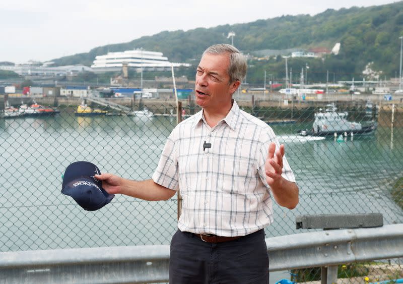 FILE PHOTO: British Brexit Party leader Nigel Farage speaks during a visit at Dover harbour, in Dover