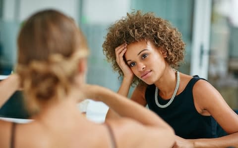 Shot of two coworkers talking together while sitting in a modern office - Credit: &nbsp;Getty Images