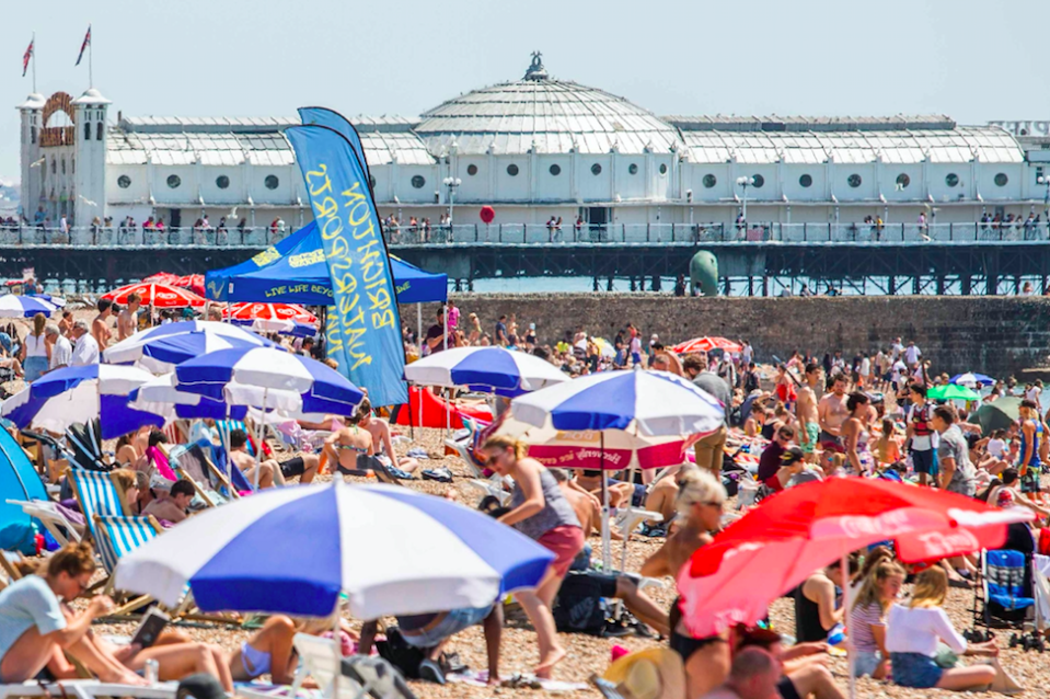 <em>Brits have flocked to beaches as the hot weather shows no signs of slowing down (Rex)</em>