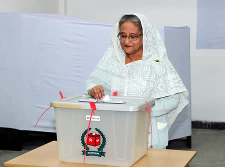 Prime Minister Sheikh Hasina casts her vote in the morning during the general election in Dhaka, Bangladesh, December 30, 2018. Bangladesh Sangbad Sangstha/Handout via REUTERS