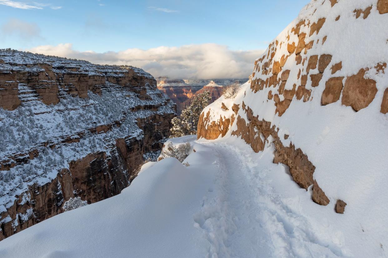 Bright Angel Trail on the South Rim of the Grand Canyon with snow after a winter storm.