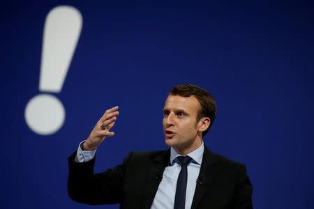 Emmanuel Macron, head of the political movement En Marche !, or Forward !, and candidate for the 2017 French presidential election, attends a political rally in Lille, France January 14, 2017. REUTERS/Pascal Rossignol