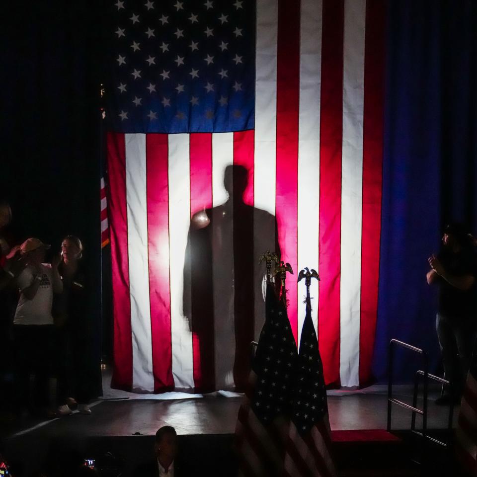 Donald Trump makes his entrance at the Waukesha County Expo Center in Waukesha, Wisconsin for a campaign rally on Wednesday, May 1, 2024