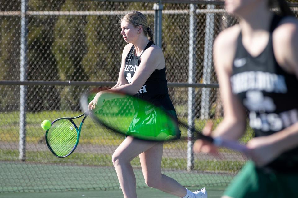 Sheldon’s Emerson Kearney goes after the ball during a doubles match with sister Hayden Kearney Thursday, March 14, 2024 at Sheldon High School in Eugene.