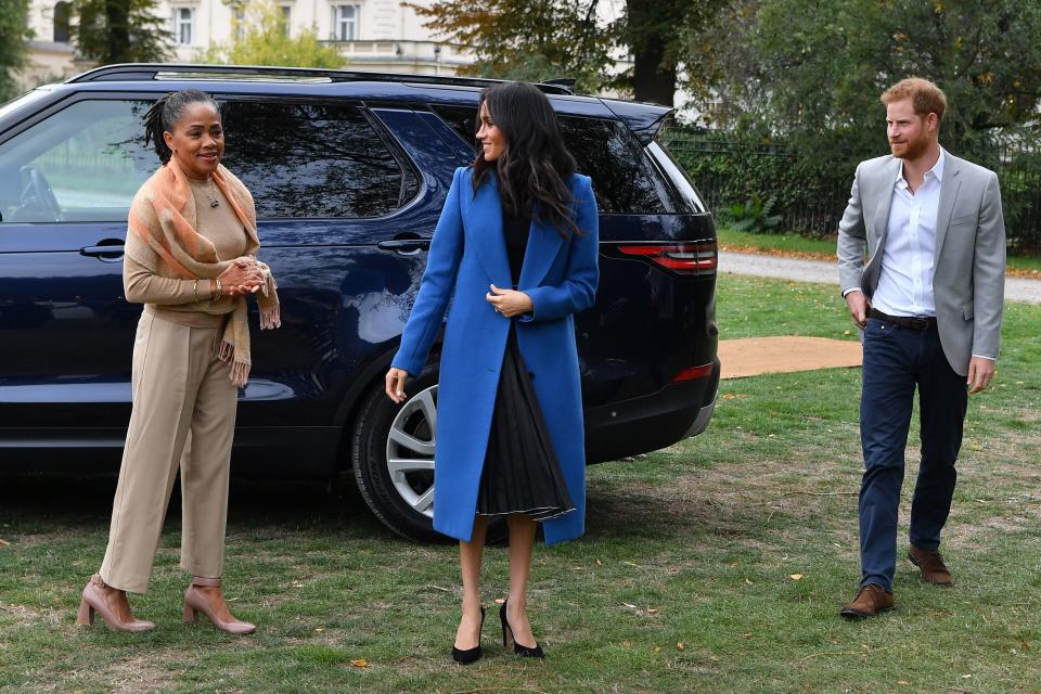 Meghan, Duchess of Sussex arrives with her mother, Doria Ragland and Prince Harry, Duke of Sussex to host an event to mark the launch of a cookbook.&nbsp; (Photo: BEN STANSALL via Getty Images)