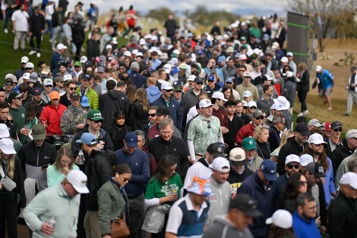 SCOTTSDALE, ARIZONA - FEBRUARY 10: Fans walk along the course on the 15th hole during the continuation of the second round of WM Phoenix Open at TPC Scottsdale (Stadium Course) on February 10, 2024 in Scottsdale, Arizona. (Photo by Ben Jared/PGA TOUR via Getty)