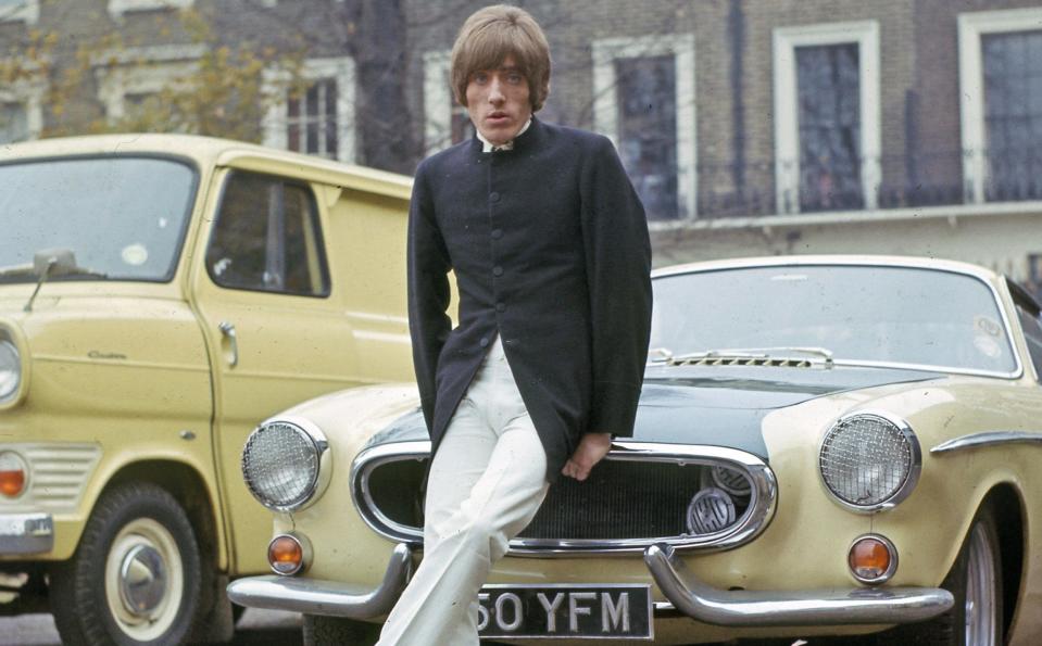 Roger Daltrey with his Volvo P1800 Coupe in Chelsea, 1966