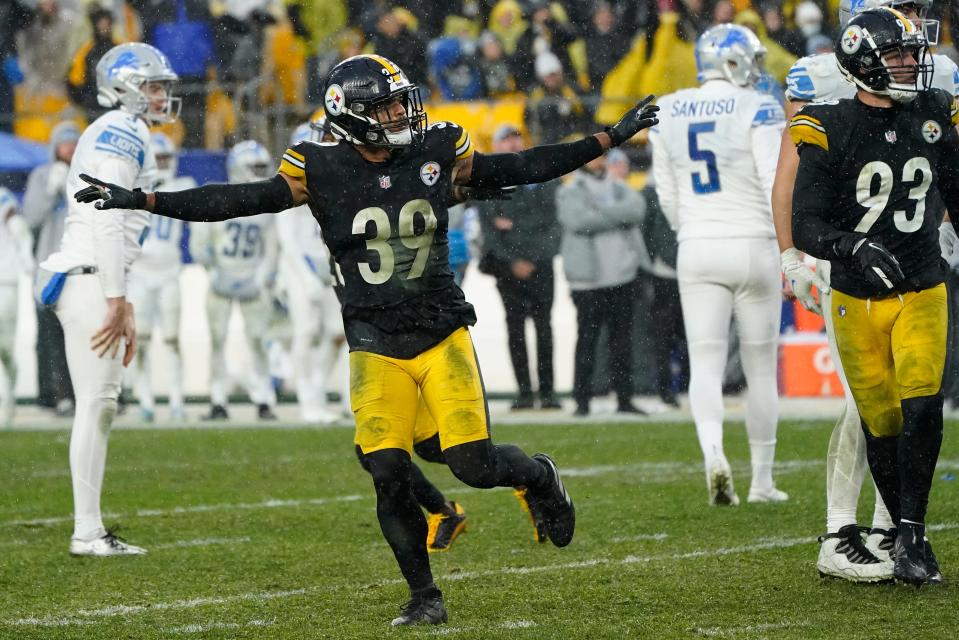 Detroit Lions kicker Ryan Santoso (5) walks off the field after missing a game-winning field goal-attempt.