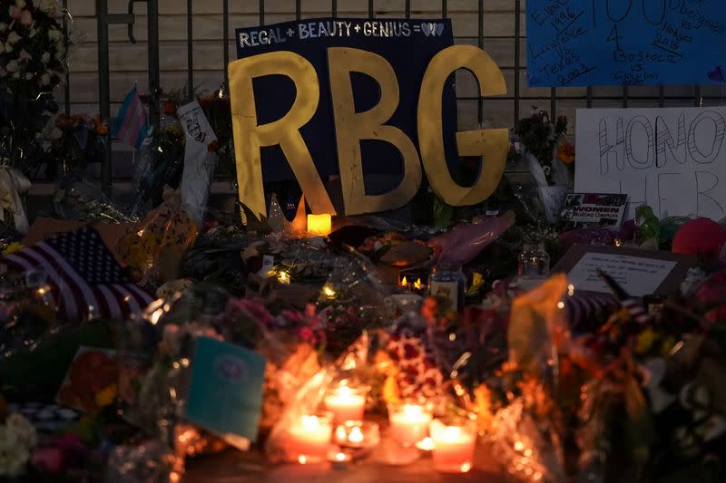 People gather to mourn the death of Associate Justice Ruth Bader Ginsburg at the Supreme Court in Washington