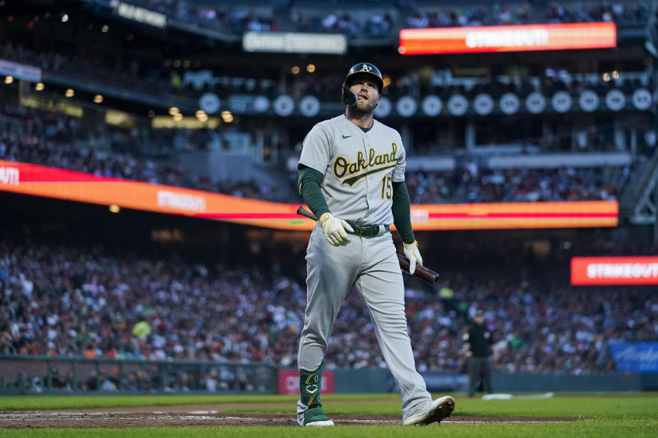 Oakland Athletics' Seth Brown walks to the dugout after striking out against the San Francisco Giants during the sixth inning of a baseball game, Tuesday, July 25, 2023, in San Francisco. (AP Photo/Godofredo A. Vásquez)