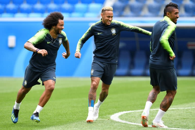 Brazil's (from L) Marcelo, Neymar and Paulinho attend a training session in Saint Petersburg on June 21, on the eve of their Russia 2018 World Cup Group E match against Costa Rica