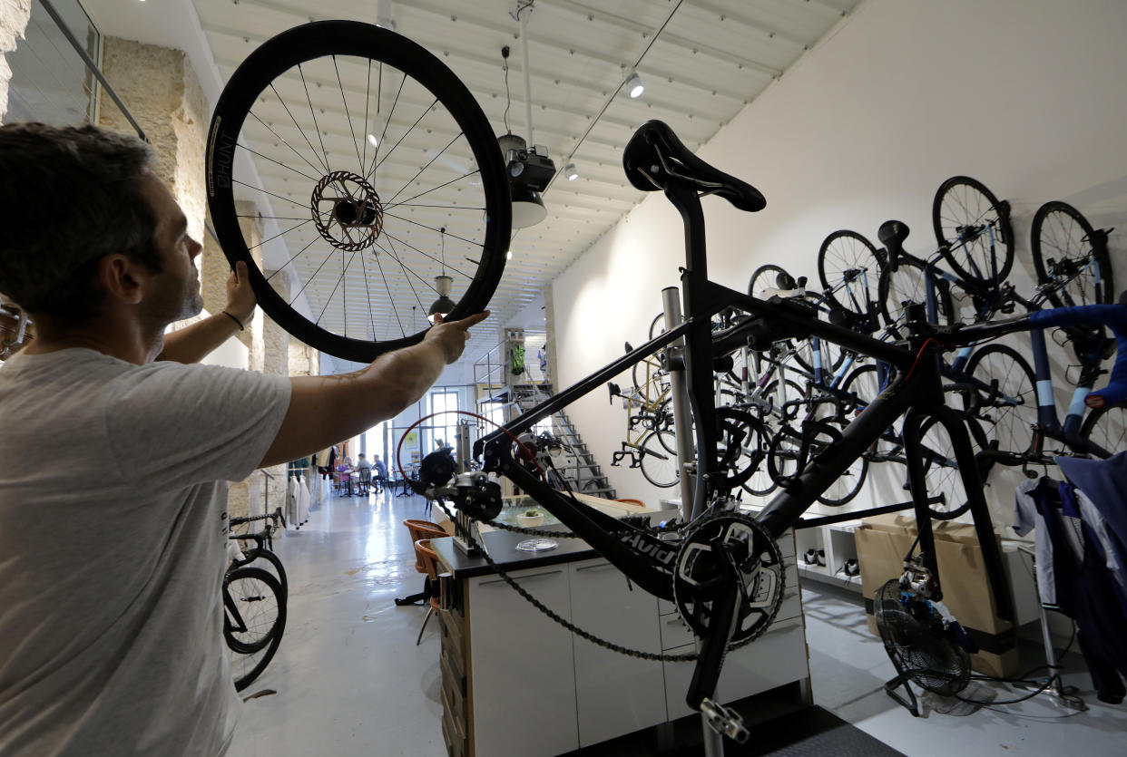 The Cafe du Cycliste bike shop in Nice, France. Bike shops are repositioning themselves as cafes, bars, and community spaces to stay alive. (Source: Reuters)