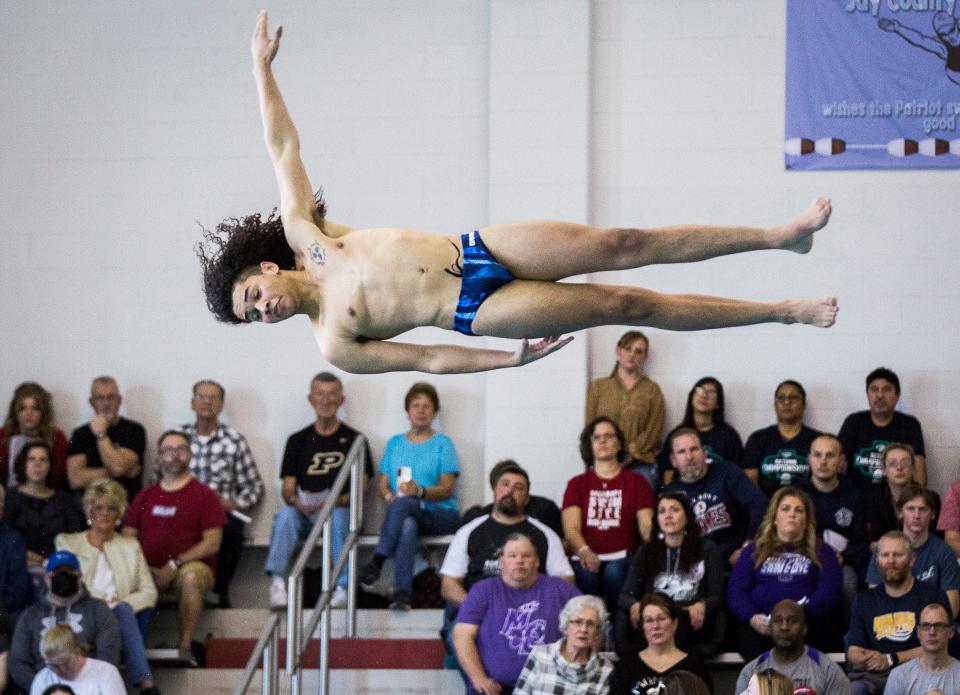 Delta's Tre Phillips competes in 1 meter diving at Jay County High School Saturday, Feb. 19, 2022.  