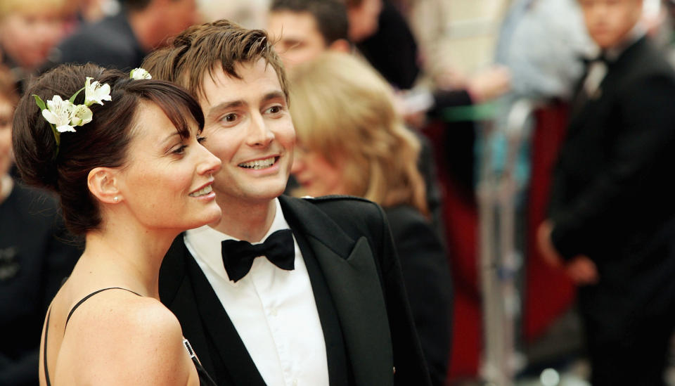 Sarah Parish and David Tennant arrive at The Pioneer British Academy Television Awards at the Theatre Royal on April 17, 2005 in London.  (Photo by Gareth Cattermole/Getty Images) 