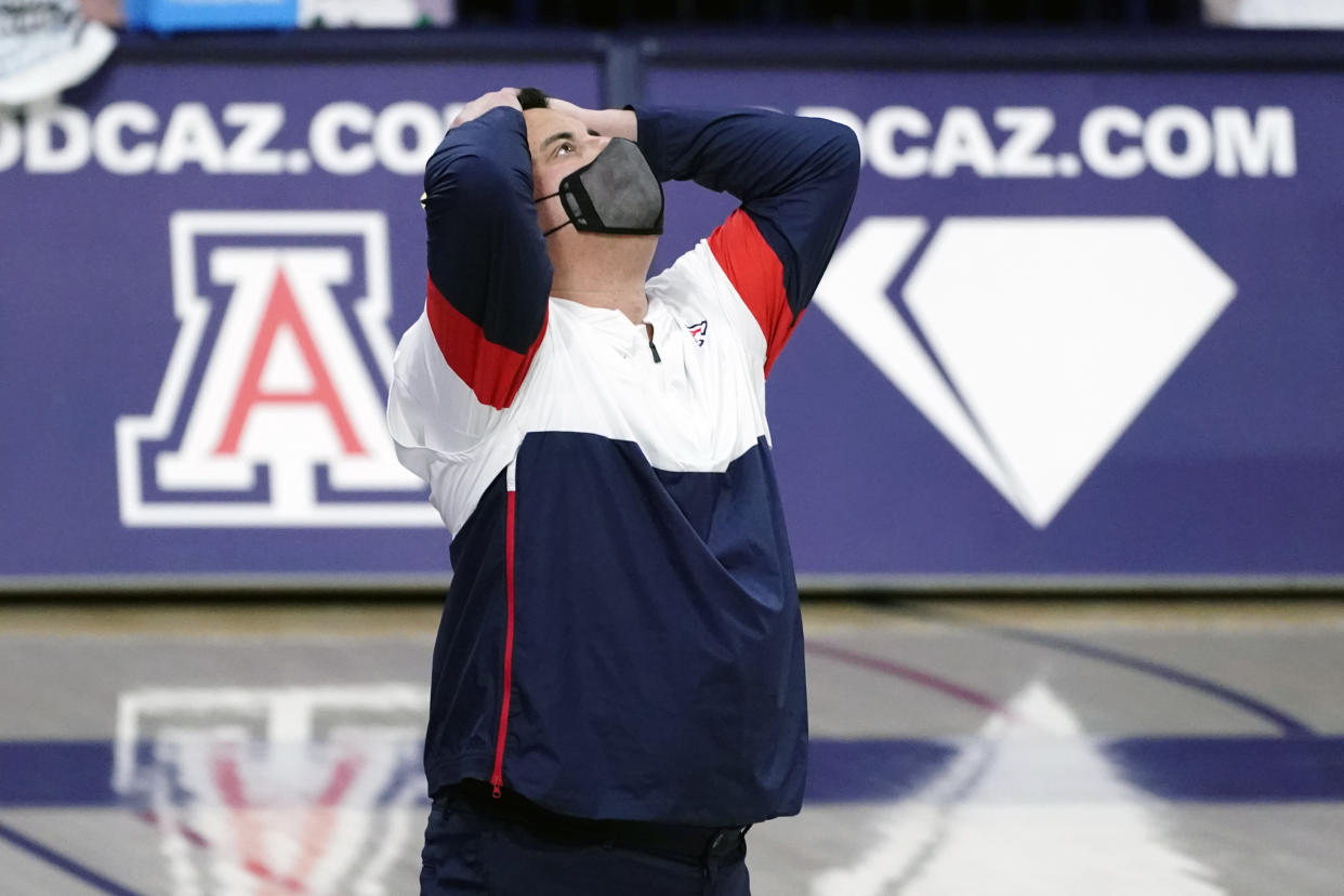 FILE - Arizona head coach Sean Miller reacts during the first half of an NCAA college basketball game against UCLA in Tucson, Ariz., in this Saturday, Jan. 9, 2021, file photo. Arizona has parted ways with men's basketball coach Sean Miller as the program awaits its fate in an NCAA infractions investigation, a person with knowledge of the situation told The Associated Press. The person told the AP on condition of anonymity Wednesday, April 7, 2021, because no official announcement has been made.(AP Photo/Rick Scuteri, FIle)