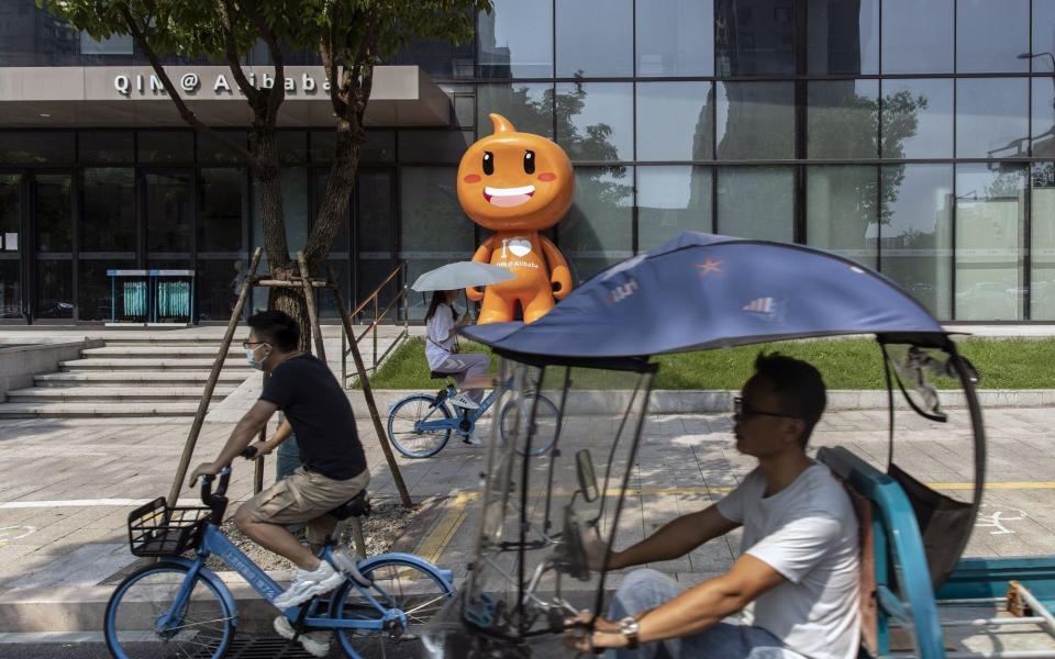 Alibaba job cuts - Qilai Shen/Bloomberg