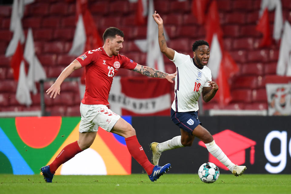 COPENHAGEN, DENMARK - SEPTEMBER 08: Pierre Emile Hojbjerg of Denmark and Raheem Sterling of England battle for the ball during the UEFA Nations League group stage match between Denmark and England at Parken Stadium on September 08, 2020 in Copenhagen, Denmark. (Photo by Michael Regan/Getty Images)