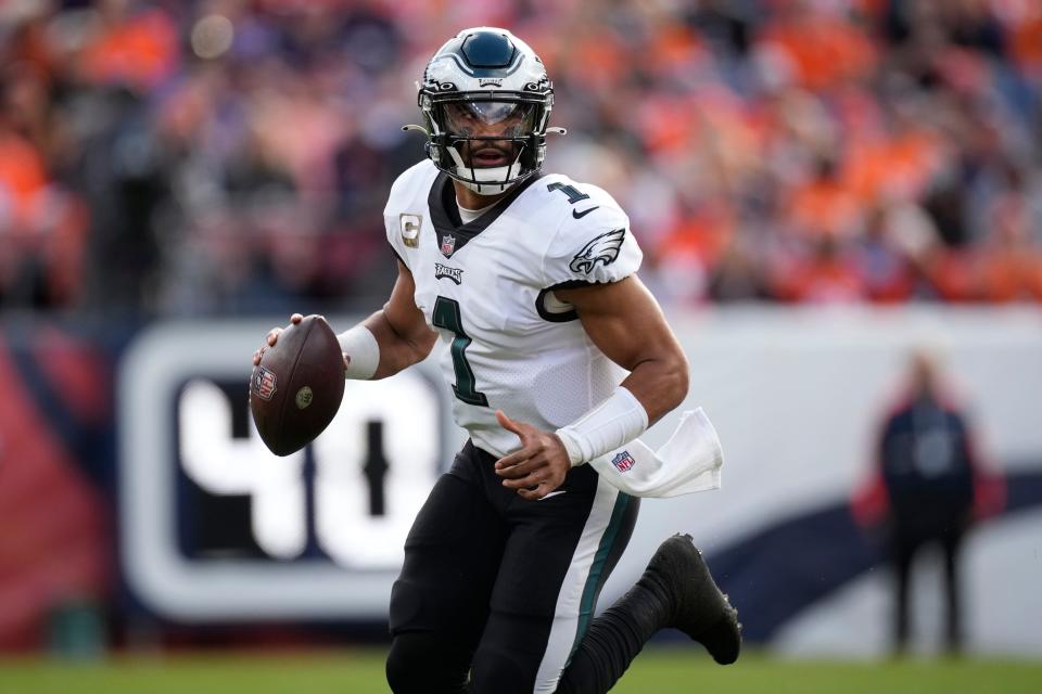 Philadelphia Eagles quarterback Jalen Hurts (1) looks to throw against the Denver Broncos during the first half of an NFL football game, Sunday, Nov. 14, 2021, in Denver. (AP Photo/David Zalubowski)