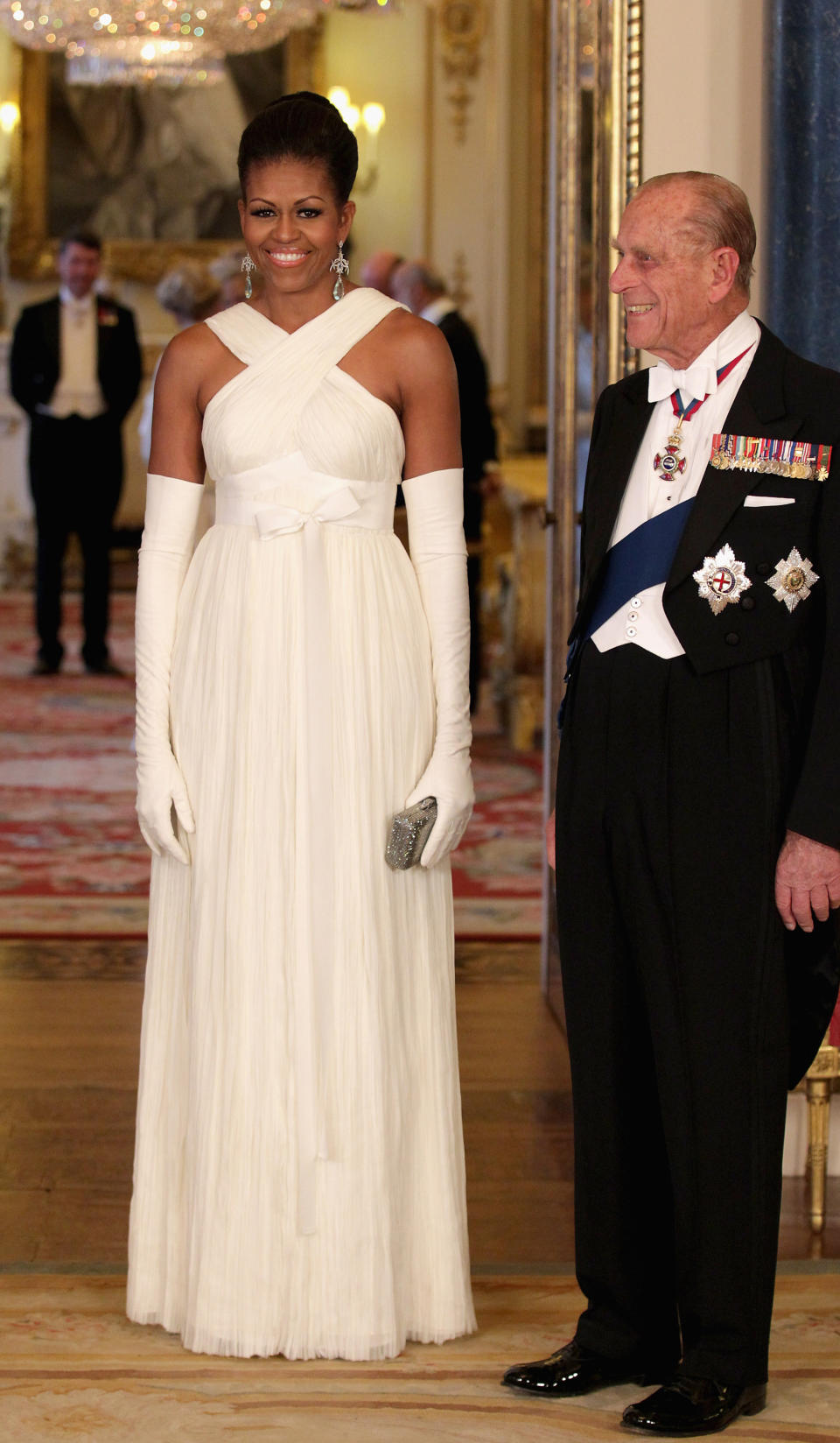 For a visit to Buckingham Palace in 2011, Obama wore a beautiful white gown designed by Tom Ford.