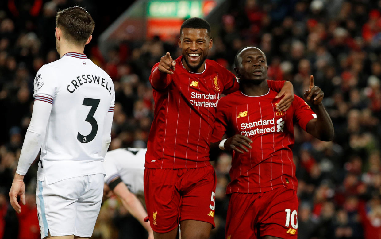 Soccer Football - Premier League - Liverpool v West Ham United - Anfield, Liverpool, Britain - February 24, 2020  Liverpool's Sadio Mane celebrates scoring a goal with Georginio Wijnaldum before it is disallowed following a referral to VAR REUTERS/Phil Noble  EDITORIAL USE ONLY. No use with unauthorized audio, video, data, fixture lists, club/league logos or "live" services. Online in-match use limited to 75 images, no video emulation. No use in betting, games or single club/league/player publications.  Please contact your account representative for further details.