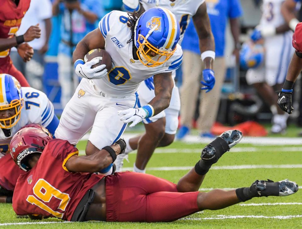 Fort Valley State running back Brandon Marshall, running against Tuskegee earlier this season, is second in the SIAC with 893 rushing yards and 8 touchdowns.