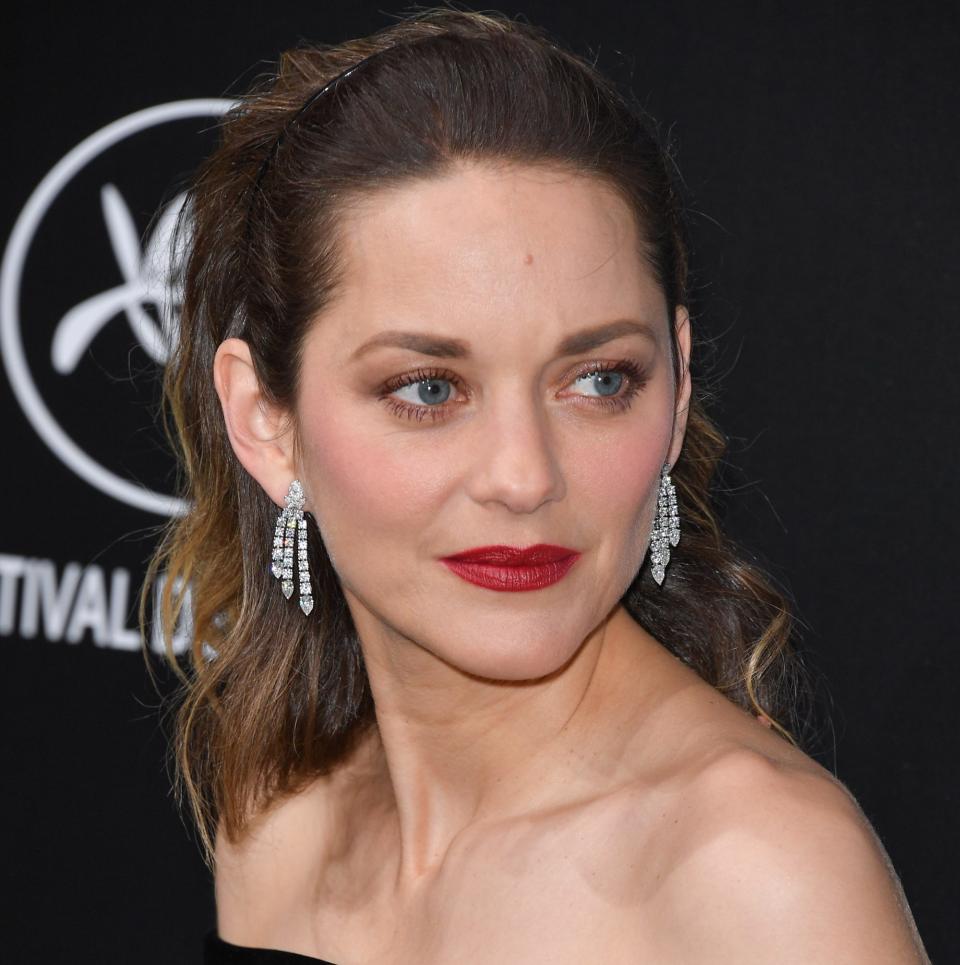 Marion Cotillard in 2019 with an ever so slightly imperfect red lip - Getty Images