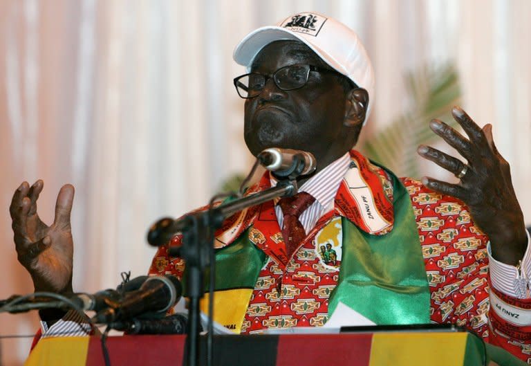 Zimbabwe's President and leader of ruling ZANU-PF party Robert Mugabe in Gweru, on December 8, 2012. Mugabe criticises Nelson Mandela for being too soft on whites, in a documentary giving a rare and intimate look into the family life of one of Africa's longest serving and most vilified leaders