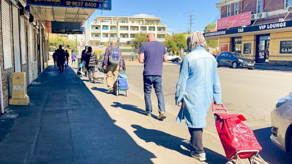 People waiting to get into the OzHarvest Market in Waterloo