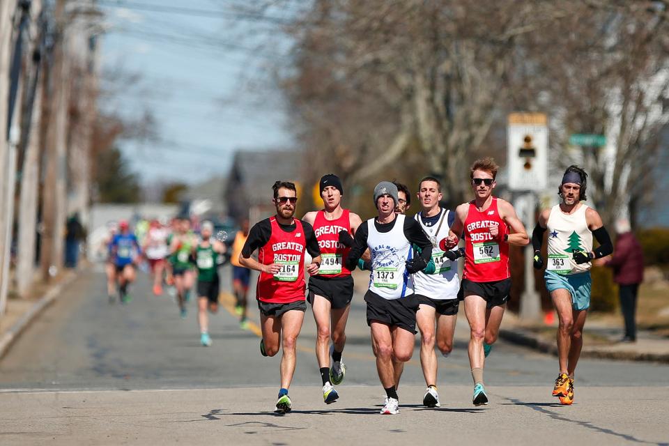 New Bedford Half Marathon An engaged couple takes the top spots