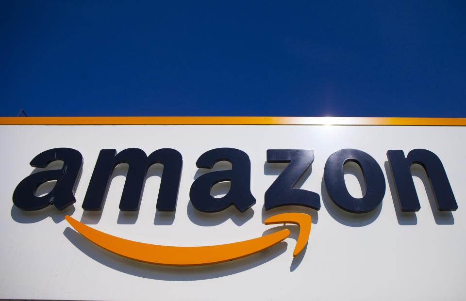 FILE - In this April 16, 2020, file photo, the Amazon logo is displayed in Douai, northern France. Amazon said Tuesday, May 18, 2021, that it will continue to ban police use of its face-recognition technology beyond the one-year ban it announced last year. (AP Photo/Michel Spingler, File)