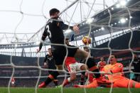 <p>Alexis Sanchez puts Arsenal ahead with his controversial handball goal</p>