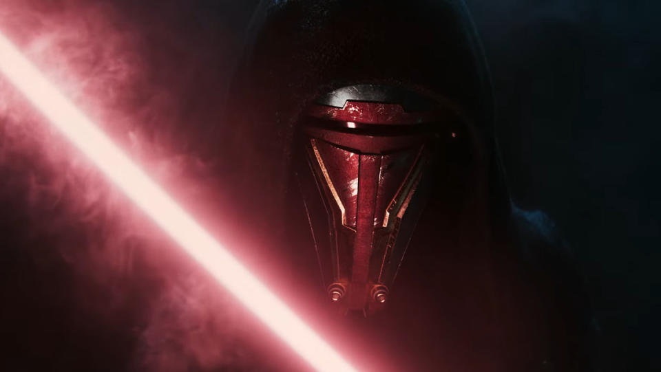 A red lightsaber in front of a masked character in Star Wars: Knights of the Old Republic remake teaser