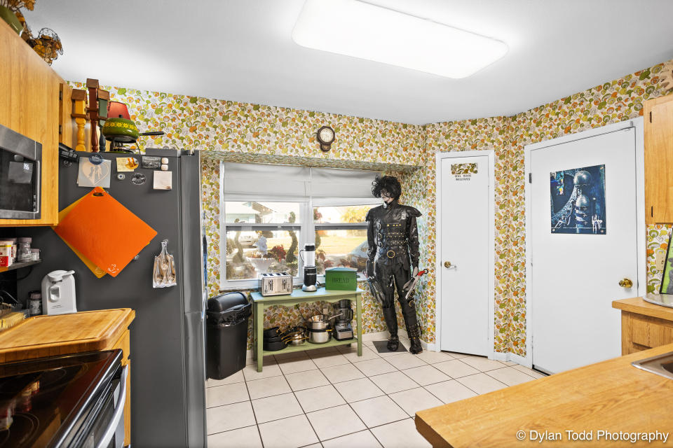 An Edward Scissorhands mannequin stands at attention in the kitchen of 1774 Tinsmith Circle. (Photo: @Dylan Todd Photography)