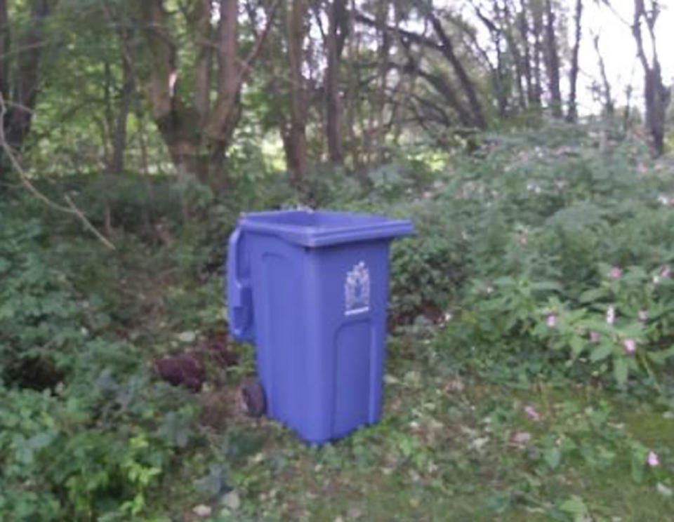 The blue wheelie bin found in the cemetery, which prosecutors said Price used to move Birbeck's body. (PA Images/Lancashire Constabulary)