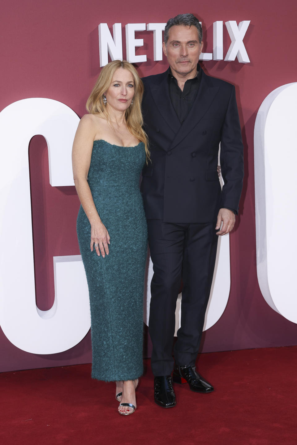 Gillian Anderson and Rufus Sewell pose for photographers upon arrival at the World premiere of the film 'Scoop' on Wednesday, March 27, 2024 in London. (Photo by Vianney Le Caer/Invision/AP)