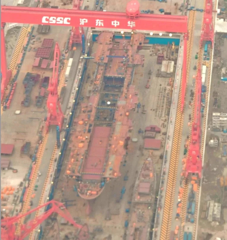 A picture of the Type 076 under construction that emerged online earlier in May. Note what may be a gap for an aircraft elevator on the port (left) side of the stern end of the hull. <em>Chinese Internet</em>