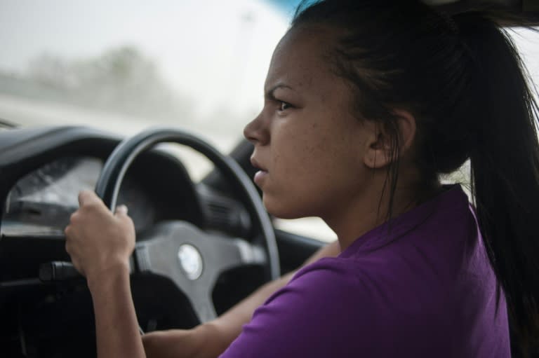 Stacey-Lee May drives her car during a round of spinning at the Midway spinning event in Soweto, on September 26, 2015