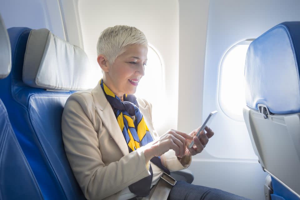 An air steward has revealed you don't really need to turn your phone off. Source: Getty