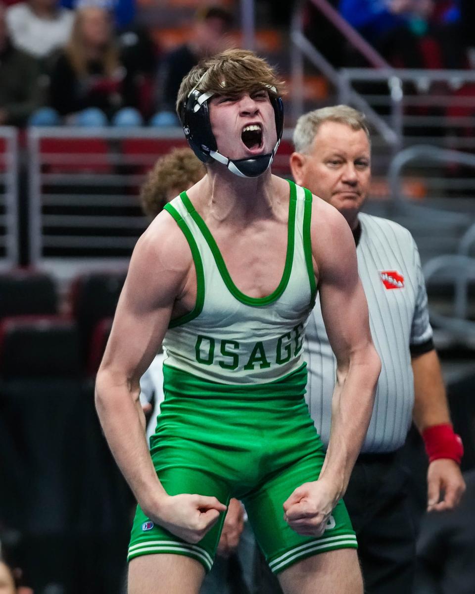 Osage’s Tucker Stangel celebrates his win over Assumption, Davenport’s Michael Macias at 145 pounds during the semifinals of the Class 2A of the Iowa high school state wrestling tournament at Wells Fargo Arena in Des Moines on Friday, Feb. 17, 2023.